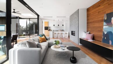 white couch beside brown wooden table